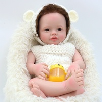 Réaliste 22 pouces mignon Silicone fille poupée peluche Reborn mode Bebe bricolage dessin animé jouet bébé