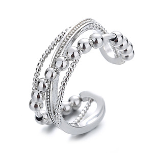 Anillo Abierto Ajustable de Varias Capas con Cuentas, Diseño Trenzado Texturizado en Bronce y Plata, Estilo Unisex - Product Image 1