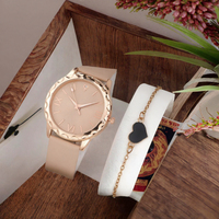 Montre-bracelet pour femme minimaliste plaquée or rose, cadran rond à index mixtes, lunette à bord concave, fabrication sur mesure en usine