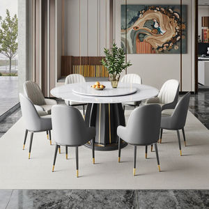 Tables rondes de style italien avec plateau en pierre frittée blanche et base unique en forme de piédestal pour meubles de salle à manger modernes. - Product Image 4