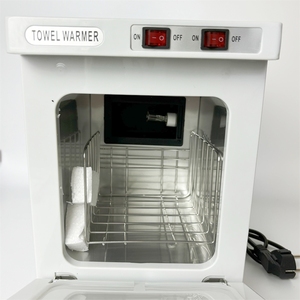 Una máquina de gabinete calentador de toallas calientes de gran capacidad con gabinetes esterilizadores de desinfección doble para salón de spa - Product Image 6