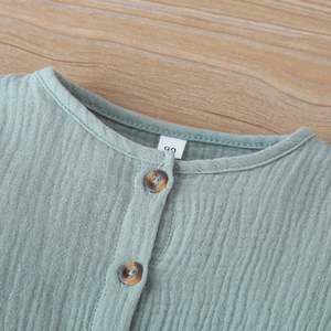 ชุดเสื้อผ้าเด็กผู้หญิงแฟชั่นใหม่ขายส่ง ชุดเซ็ต 2 ชิ้น สีพื้น ลายสก็อต เสื้อเชิ้ตและกางเกง - Product Image 4