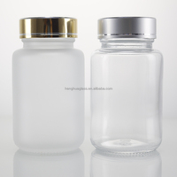 Flacon vide rond givré en verre de 100 ml pour capsules, pilules, médicaments, suppléments et vitamines avec bouchon