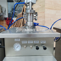 Machine de remplissage de liquides visqueux verticaux semi-automatique en acier inoxydable 304
