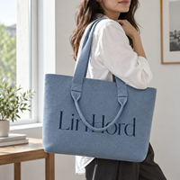 Sac à bandoulière en tricot avec logo personnalisé et poignées courtes et longues pour les collections d'accessoires urbains de marques de mode boutique