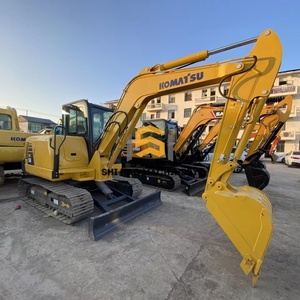 Excavadora de cadenas Komatsu PC56 de alta calidad, la más vendida, para trabajos agrícolas y paisajismo residencial - Product Image 1