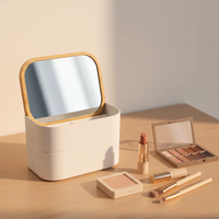 Boîte de rangement pour maquillage rectangulaire moderne en bambou à 2 niveaux empilable avec miroir et couvercle en bambou pour gagner de la place à la maison