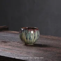 Ensemble de tasses à thé Kung Fu changées au four de style japonais petite tasse principale en céramique avec bol en porcelaine à dégustation unique d'oeuf de dragon