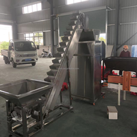 Machine de pesage semi-automatique pour l'industrie des snacks, des noix, des haricots, des céréales et des graines.
