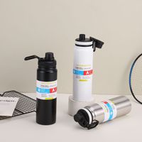 Logo personnalisé Sports de plein air portables tasses thermiques bouteilles d'eau en acier inoxydable double couche avec couvercle et bouchon pour le voyage