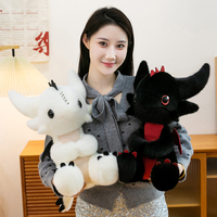 En gros : Jouets en peluche dragon, Coussins en peluche, Jouets en peluche monstre personnalisés, Jouet en peluche dragon noir et blanc