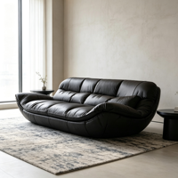 Fauteuil inclinable en cuir noir surdimensionné de style bohème, coque incurvée en fibre de verre, canapé individuel pour un espace intérieur minimaliste