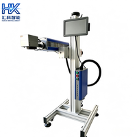 Machine de marquage laser CO2 Huike Flying pour ligne de production, équipement d'impression de date de production pour bouteilles en plastique et sacs d'emballage alimentaire