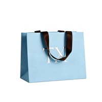 Sac en papier épais de luxe imprimé sur mesure avec poignée flexible et ruban, sac cadeau