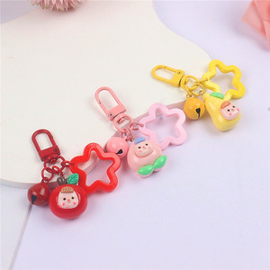 Llaveros de muñecas de frutas coloridas, bonitos dijes de estrella y campana, accesorios para fundas de auriculares y bolsos, paquete al por mayor - Product Image 1
