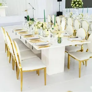 โต๊ะทองและสีขาว-และ-เก้าอี้-สำหรับกิจกรรมงานปาร์ตี้เก้าอี้และโต๊ะสำหรับงานแต่งงาน