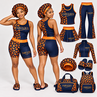 Ensemble d'entraînement uniforme de majorette personnalisé bleu marine et orange à motif léopard, comprenant un débardeur dos nageur et un short moulant, pour HBCU Battle Squad