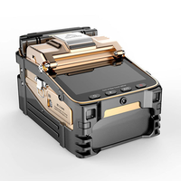Épissureuse de fibres optiques Signal Fire AI-8C avec six moteurs, mise au point automatique, épissure en 8 secondes pour les projets FTTH