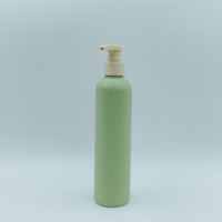 Flacon pompe en plastique HDPE vert doux au toucher personnalisé populaire pour shampooing, après-shampooing, lotion, gel douche 200 ml 300 ml 500 ml