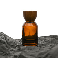 Botol silinder kaca parfum kelas atas 50ml 100ml, botol kaca Amber, tutup kayu bentuk segitiga