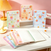 Carnet à spirale souple A5 147mm*212mm 80GSM 70 feuilles lignées avec motif d'ailes d'ours mignon, couverture en PP, 4 couleurs, 168 pièces/carton, vente en gros