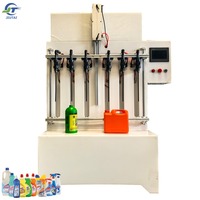 Machine semi-automatique à quatre têtes pour le remplissage de petites bouteilles de liquides (boissons, eau pure, produits chimiques, détergents), avec moteur, PLC, et convoyeur à diaphragme