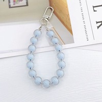Lanière de téléphone à perles de nacre, bracelet anti-perte, breloque tendance, porte-clés, décoration de portefeuille, pendentif pour femmes