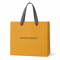 Sac de shopping en papier de luxe personnalisé avec logo en feuille d'or, emballage cadeau haut de gamme, fabricant OEM