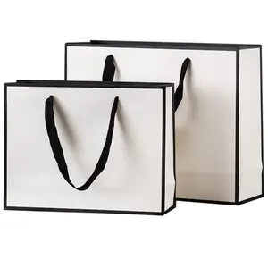 사용자 정의 제품 부티크 캐리어 가방 의류 포장 가방 접이식 재사용 Paperbag 종이 쇼핑 가방 로고