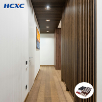 Alternative écologique au bois pour l'intérieur, panneau mural et de plafond en WPC à rainures 3D, revêtement mural intérieur en composite plastique PVC