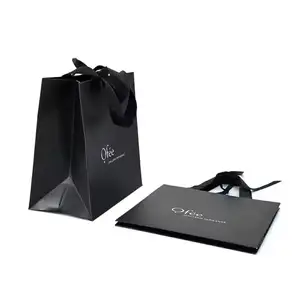 थोक कस्टम प्रिंट लक्जरी उपहार काला खरीदारी पेपर बैग रिबन धनुष के साथ संभाल