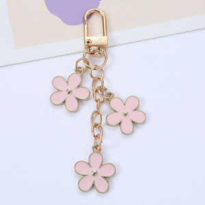 Llavero de aleación de zinc multicolor con diseño floral, bonito colgante de doble cara esmaltado para bolso, accesorios DIY con diseño de margarita dulce - Product Image 4