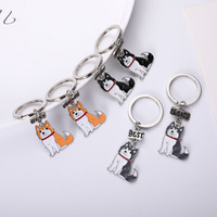 Nouveau mini porte-clés en métal pour chiot, clochette pour chien, accessoires de bijoux, porte-clés créatif en forme de dessin animé avec goutte d'huile