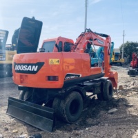 Excavatrice sur pneus d'occasion Doosan DX150W-9C, 15 tonnes, pelle hydraulique, godet de 0,57 m³, engin de construction