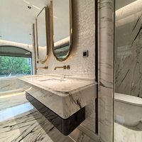 Lavabo mural en marbre Calacatta Viola, pierre italienne de luxe, contemporain et écologique, pour hôtel et villa