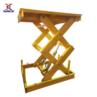 Plateforme élévatrice à ciseaux hydraulique fixe certifiée CE pour le levage de cages de marchandises en entrepôt