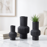 Vase en porcelaine texturée noir mat moderne et populaire pour la décoration de table intérieure