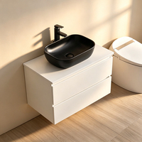 Meuble-lavabo mural flottant moderne de style nordique minimaliste, blanc, avec lavabo ovale noir à poser sur le comptoir