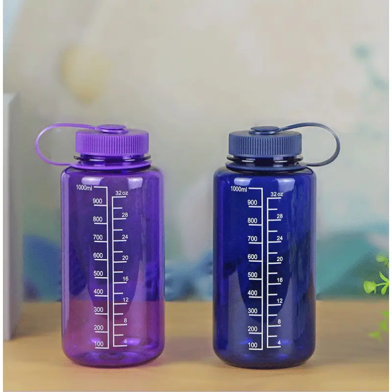 Bottiglia d'acqua liquida trasparente in plastica senza Bpa con bottiglia d'acqua sportiva in plastica trasparente da 1000ml