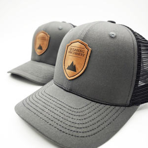 Premium Quality Custom Sewn on Leather Patch Embroidery Trucker Hat 6 Panel Richardson 112 Mesh Back Trucker Hat Caps - Product Image 5