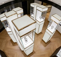 Élégant 360 °   Support d'exposition pour montre, vitrine de luxe en verre blanc et or pour une seule montre de luxe