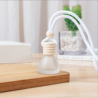 Diffuseur d'aromathérapie pour voiture en verre, pendentif, flacon de parfum, diffuseur d'aromathérapie pour voiture suspendu, vente en gros