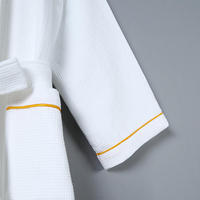 Peignoir en éponge gaufré de couleur blanche 100% coton confortable de luxe pour hôtel 5 étoiles avec impression personnalisée