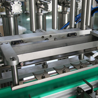Machine de remplissage de liquides visqueux d'huile d'olive de 500 ml, machine de remplissage et de bouchage de sauce piquante et d'huile de cuisson à vendre