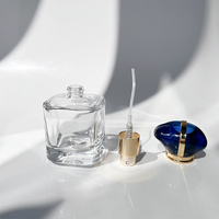 Flacon de parfum en verre rechargeable vide 30ml 50ml 100ml, type à vis, transparent, avec bouchon ovale bleu, conception anti-fuite