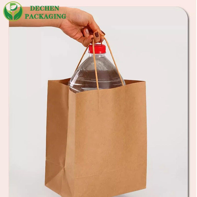 Sacs en papier de restaurant avec poignées en gros