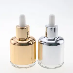 Elegante glazen drop fles 50 ml serum/etherische olie fles met aluminium gouden schouder voor luxe cosmetische verpakkingen