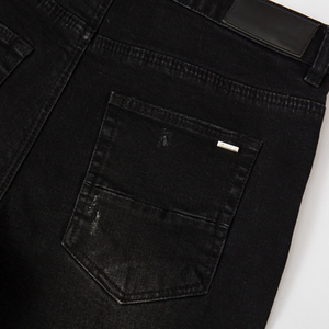 Fabrika toptan erkek sokak moda sıska Denim yüksek sokak eski düz pantolon Stonewashed bitirmek siyah yırtık pantolon
