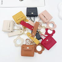 Porte-clés en cuir de style mignon et tendance avec miroir, étui à rouge à lèvres, mini sac à main et pendentif pour sacs