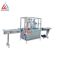 Ligne de production entièrement automatique de remplissage de gaz en aérosol pour produits cosmétiques et chimiques – Machines de remplissage à pompe haute efficacité pour canettes et bouteilles